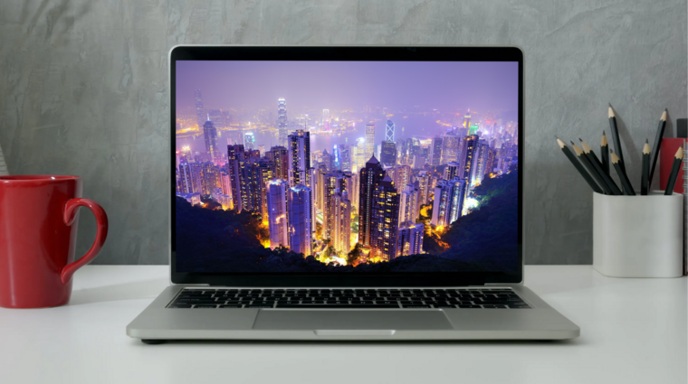 a laptop with a photo of Hong Kong