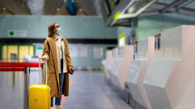 person on the airport with a luggage