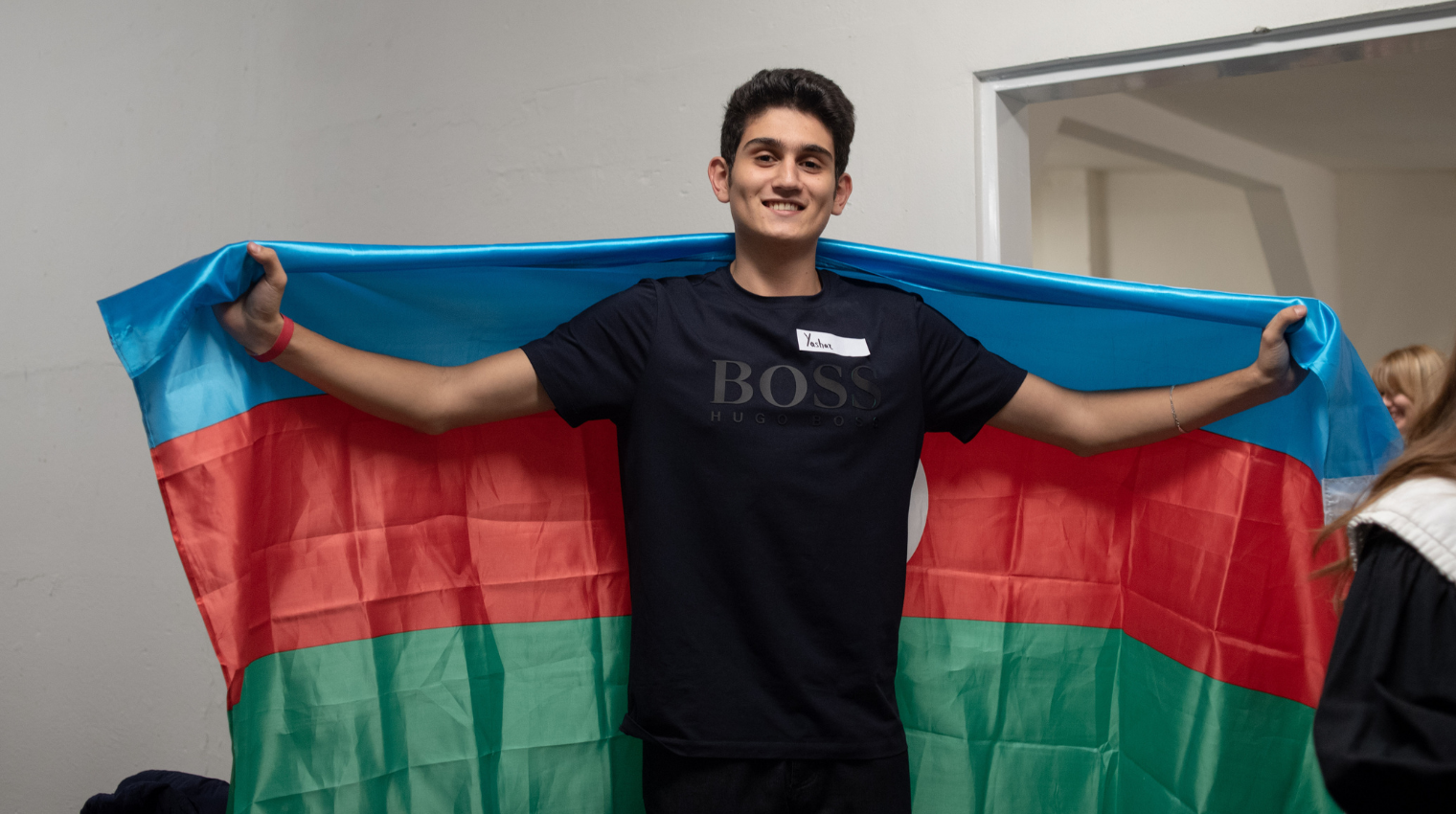student with a flag